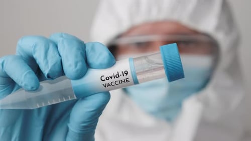 Healthcare Worker Holds Covid-19 Vaccine Vial
