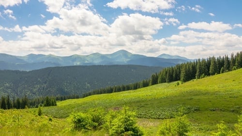 Mountain Landscape with a Fast Clouds and Shadows