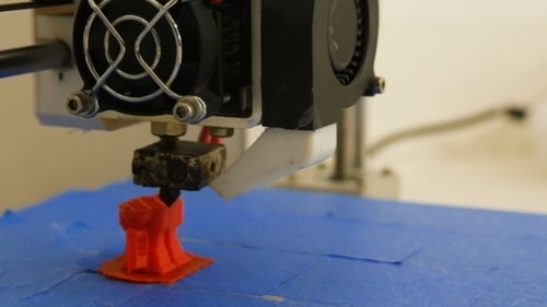 Close Up of 3D Printer Creating Object
