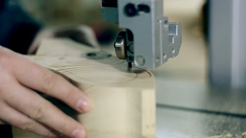 Sawing A Wooden Plank With Jig Saw