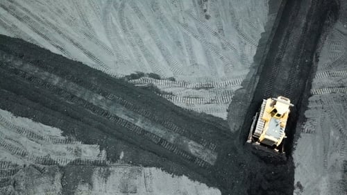 Bulldozer Moving Coal