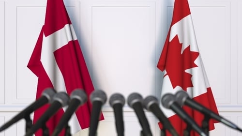 International Press Conference with Canadian and Danish Flags