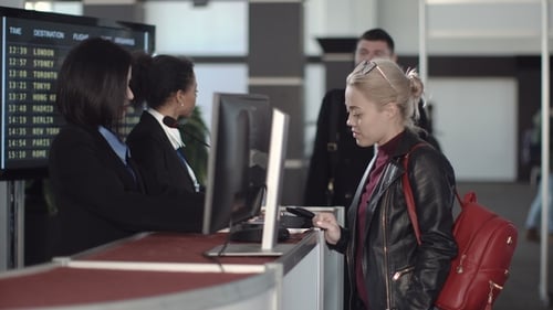 Airport Security Personnel Processing Passengers