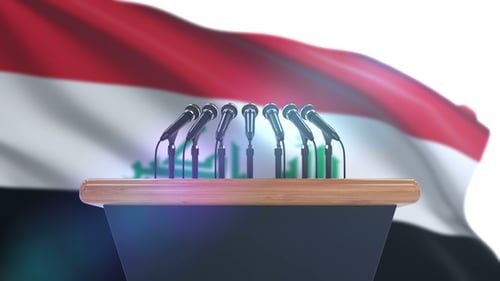 Speaker Podium with Microphones Against Waving National Flag