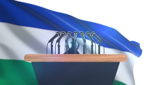 Presidential Podium with Multiple Microphones and Waving Flag Animation