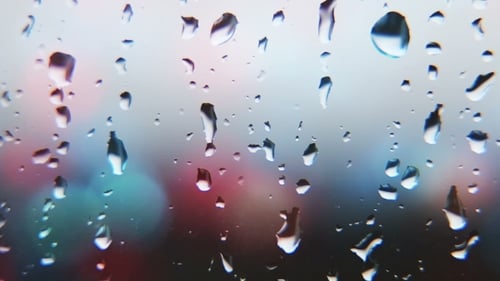 Water Droplets on Glass with Blurred Lights