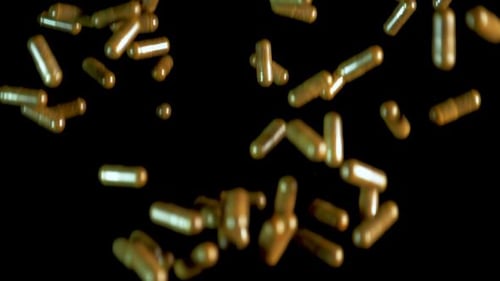 Pill Capsules are Thrown Into the Air