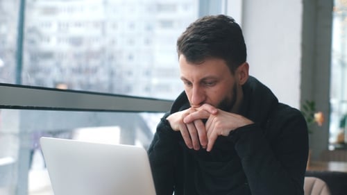 Businessman Looking at Documents