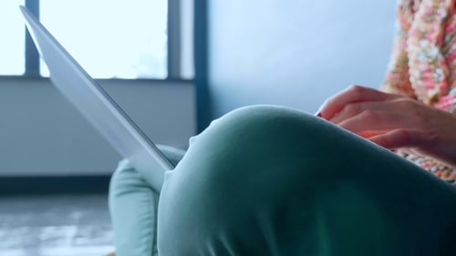 Woman Types on Laptop, Working at Home