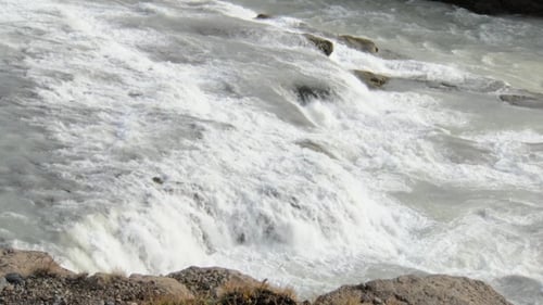 Wide River with Flows Over Rocks on a Bottom, Landscape of Reservoirs in Clear Day