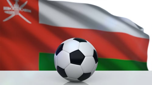 Oman National Flag Waving Behind Spinning Football