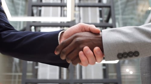Two Business People Shaking Hands