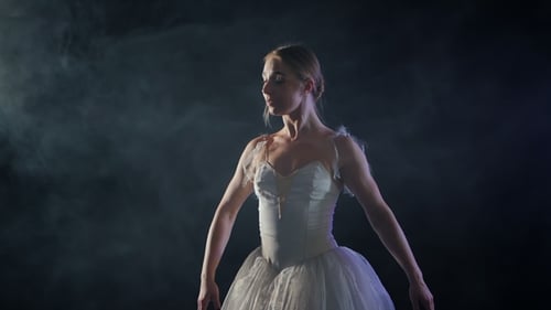 Elegant Ballerina Performing Beautiful Dance in Studio