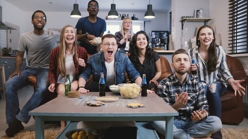 Friends Celebrating and Watching TV Together