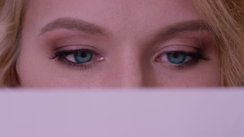 Woman's Eyes Darting in Extreme Close Up