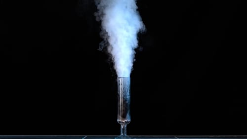 Chemical Reaction Creates Smoke in Glass Tube