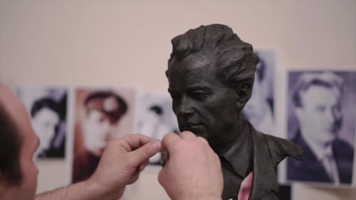 Sculptor Created a Figure of a Man. Clip. Man Creates His Own Hands the Bust of a Man. Concept Art