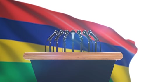 Waving Flag and Podium with Microphones for Press Conference