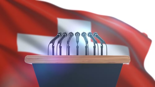 3D Podium with Microphones and Waving Switzerland Flag