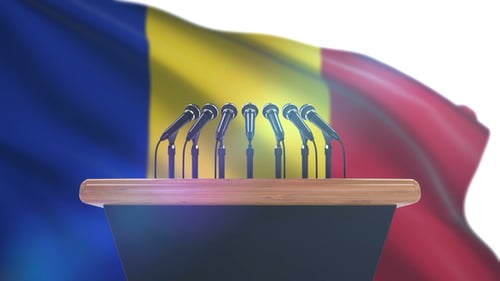 Waving Flag Background with Press Conference Podium and Microphones