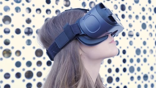 Woman Experiencing Virtual Reality with Headset