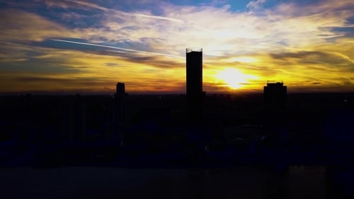 Beautiful Colorful Dramatic Sunset Sky Over Silhouette of the City. Clip. City