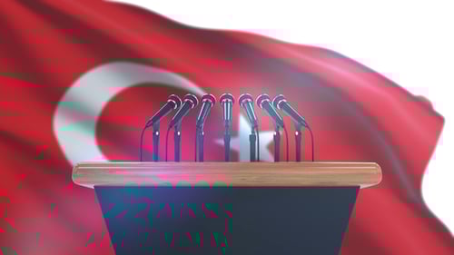 Professional Podium with Microphones and Waving Turkish Flag