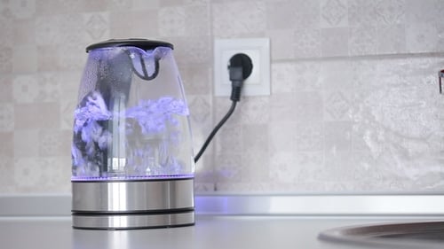 Electric Kettle Boiling Water in Modern Kitchen