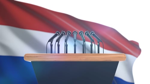Waving Flag Background with Podium and Multiple Microphones