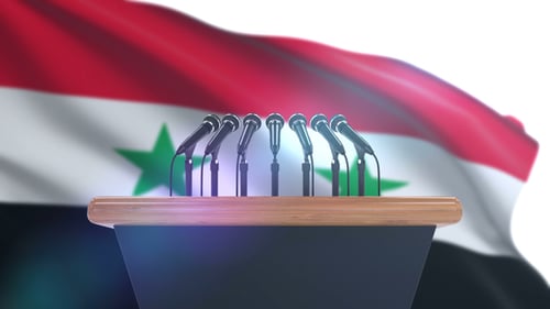 Podium With Microphones And Waving Syrian Flag For Press Conference