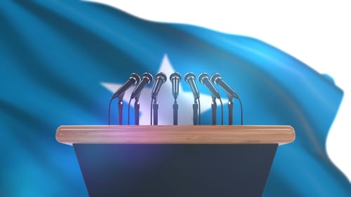 Podium and Microphones with Waving Flag for Press Conference