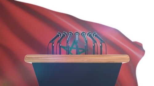 Animated Podium and Microphones with Waving Flag