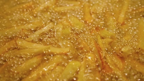 French Fries Cooking in Hot Oil