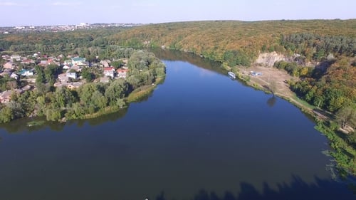 Drone Shot of Forest and Lake on Sunny Day