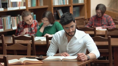 Students Revise for Exam in Library