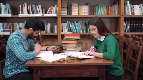 Students Studying Together at Library Table