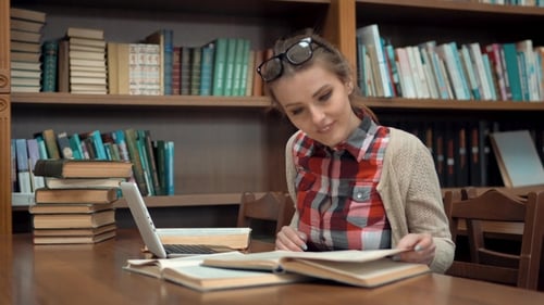 Girl at Library Table