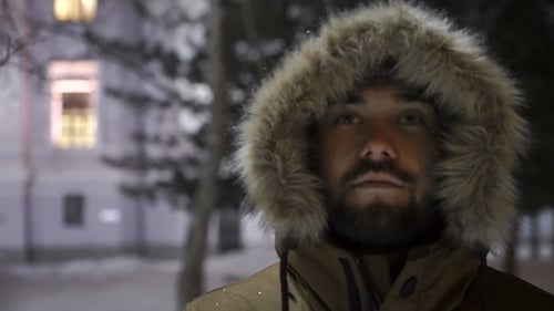 Man Is Watching Snow Falls