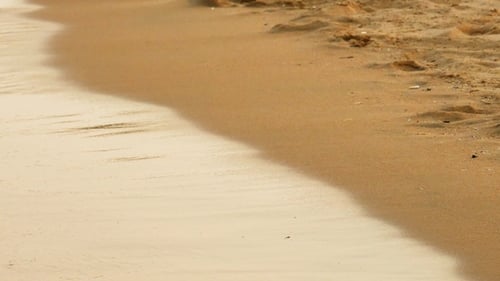 Soft Sea Waves Rushing at the Sunset