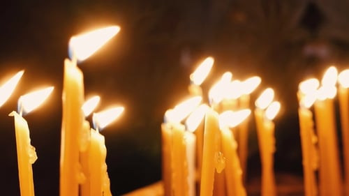 Candles Flicker in the Dark