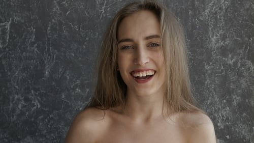 Distressed Woman Runs Hands Through Hair