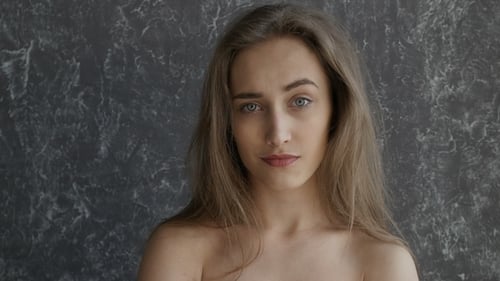 Young Woman Posing and Expressing Emotions Close Up