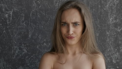 Woman Posing with Facial Expressions Indoors