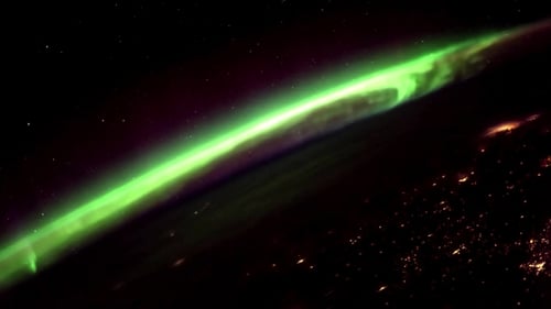Dynamic Aurora Borealis from Space Over Earth Horizon