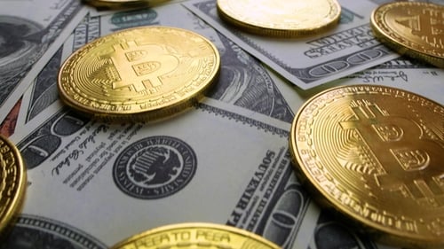 Bitcoins and US Dollar Bills for Finance Concepts