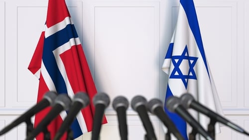 Flags of Norway and Israel at International Press Conference