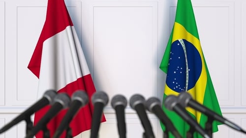 Flags of Peru and Brazil at Official Press Conference