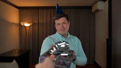 Man Receives Birthday Gift in Hotel Room