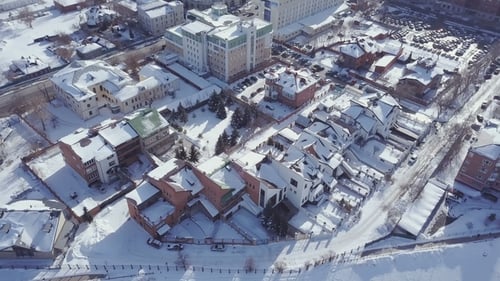 Aerial View Snow-covered City in Winter
