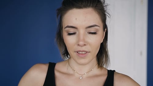 Smiling Woman in Black Tank Top Close Up